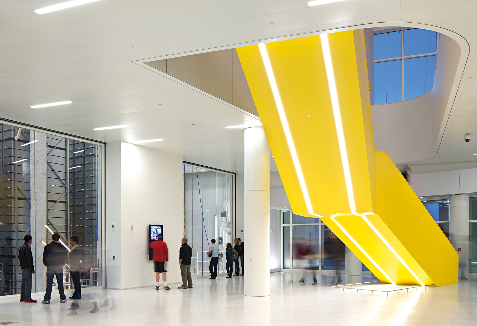 The staircase of the James B. Hunt Library, North Carolina State University. Snøhetta, 2013.  
The stair is yellow and placed right along the main sight- and circulation lines to encourage users.